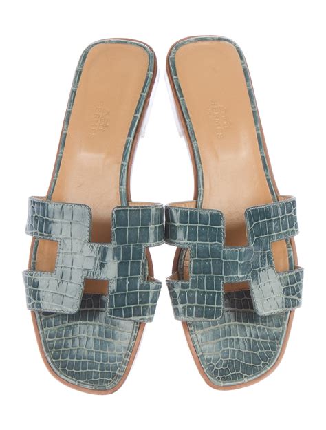 hermes oran crocodile sandals.